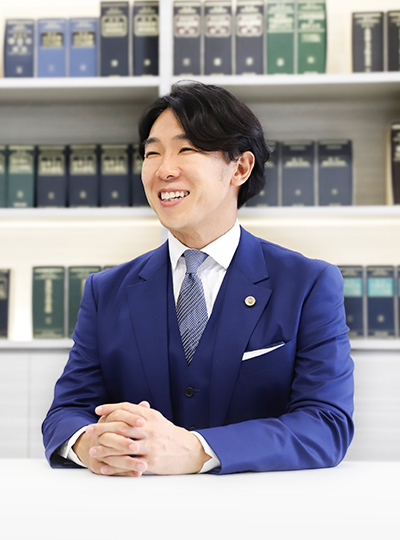 代表弁護士 長 裕康